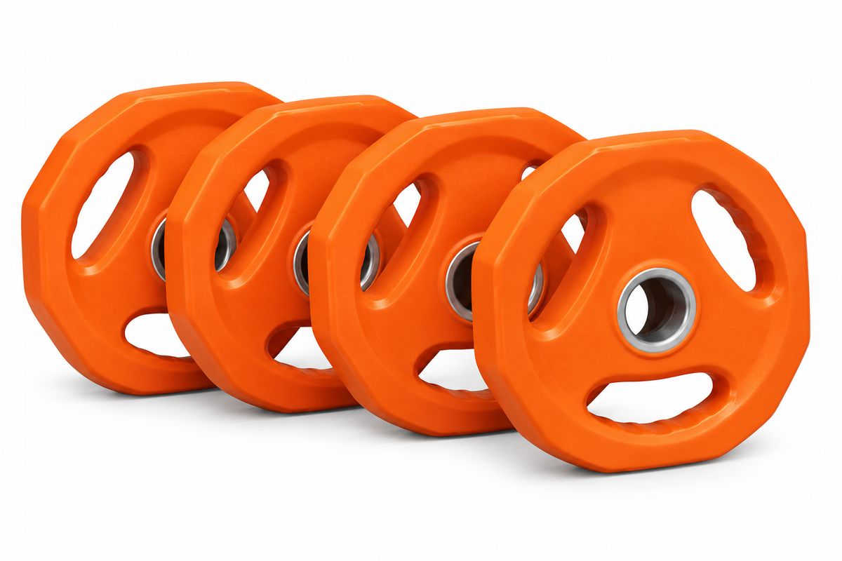 Set quattro dischi Toorx Body Pump 2,5 kg – arancio su sfondo bianco
